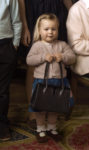 Mia Tindall Holds Queen's Purse