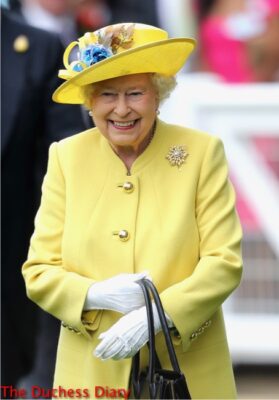 queen elizabeth yellow hat yellow coat smiling royal ascot parade ring