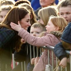 Little Girl Pink Coat Strokes Kate Middleton Hair